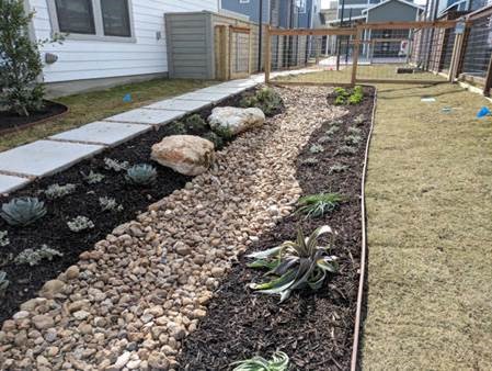 Bioswale feature at Urban at Olive subdivision in San Antonio.