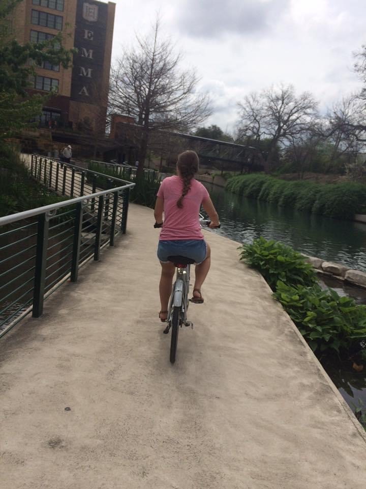 Graham Enjoying a bike ride along the Museum Reach San Antonio River Walk segment with his daughter.