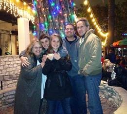 Stephen Graham enjoying the holiday lights in the downtown segment of the River Walk with his family.
