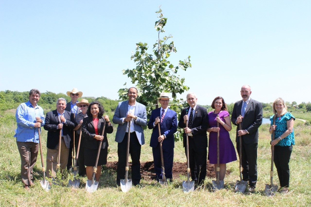 Celebrating with project partners the last tree planting of the Mission Reach Ecosystem Restoration & Recreation Project