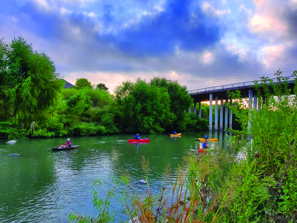 Paddlers enjoy the Mission Reach segment of the San Antonio River Walk