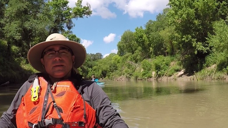 River Authority Director of External Communications Steven Schauer kayaking the San Antonio River in Goliad County.