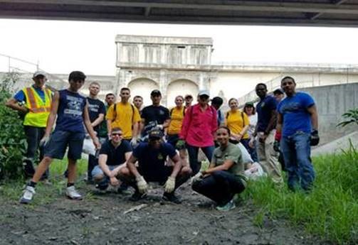 River Authority Board Member Deb B Prost  participating in a litter cleanup event in Olmos Basin.