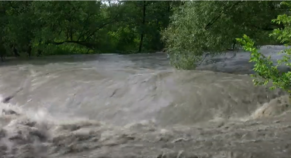 The San Antonio River flowing with water after a storm event.