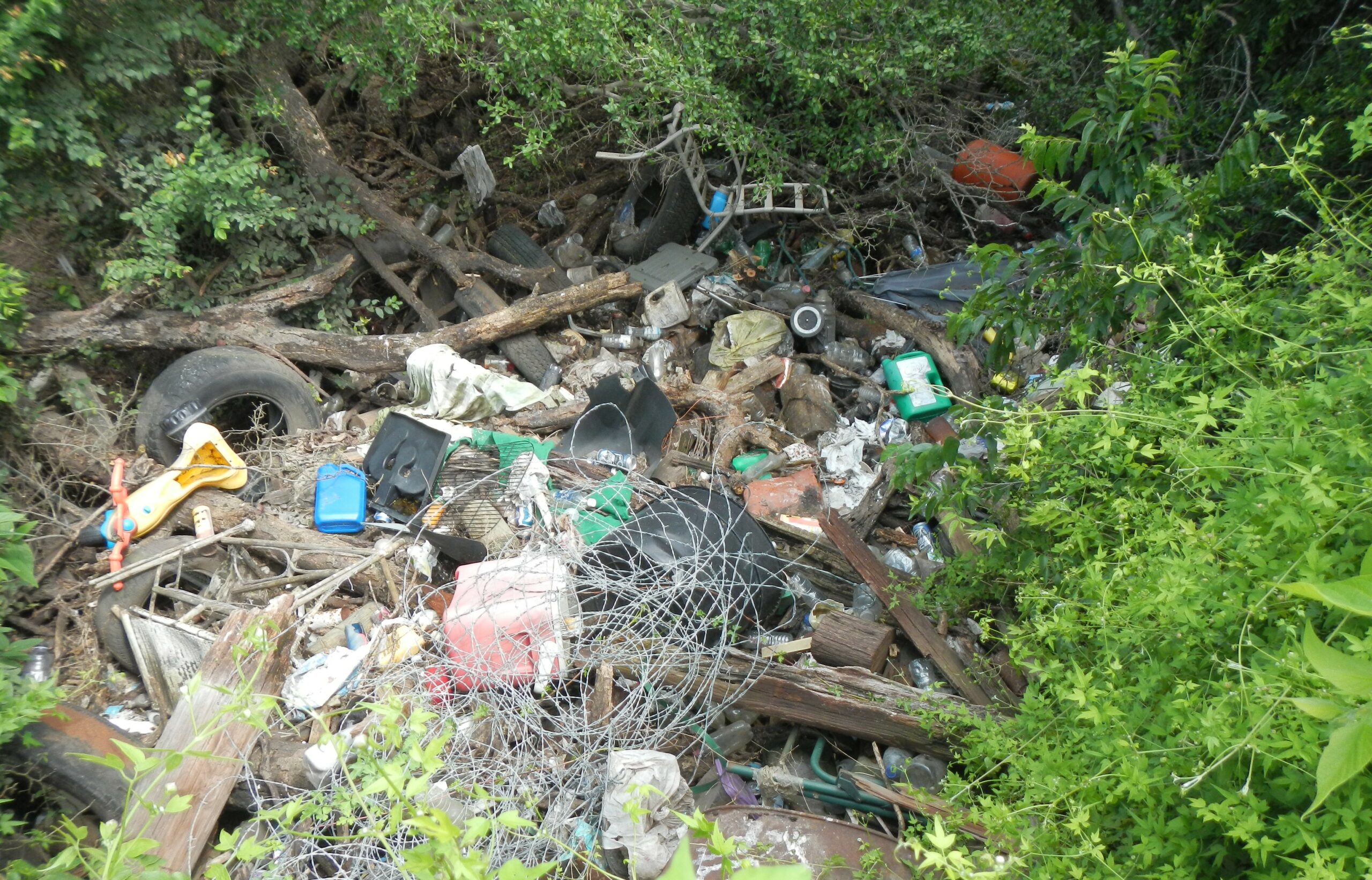 Illegal dumping site along the San Antonio River Basin