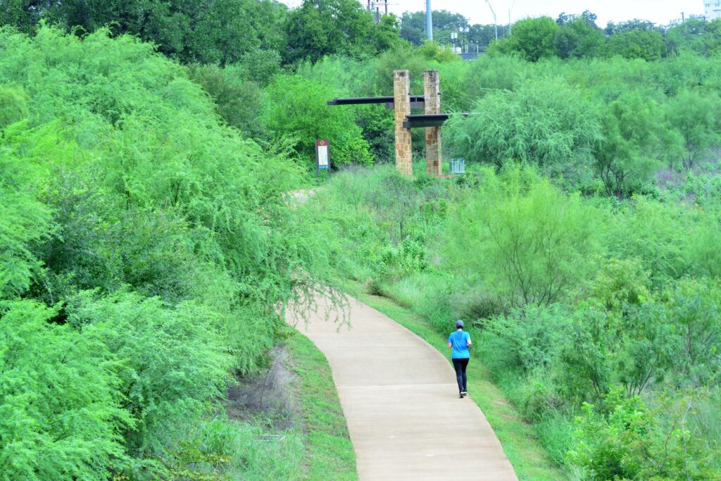 Jogger on the San Antonio River Walk Mission Reach