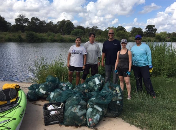 River Authority River Warrior volunteers participate in a post-storm event cleanup