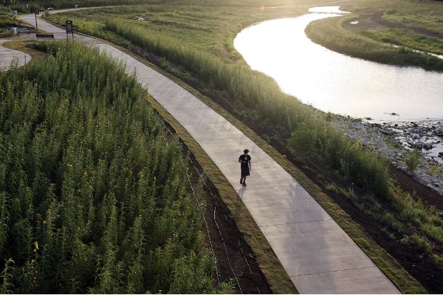Person running along Mission Reach Walking Trail