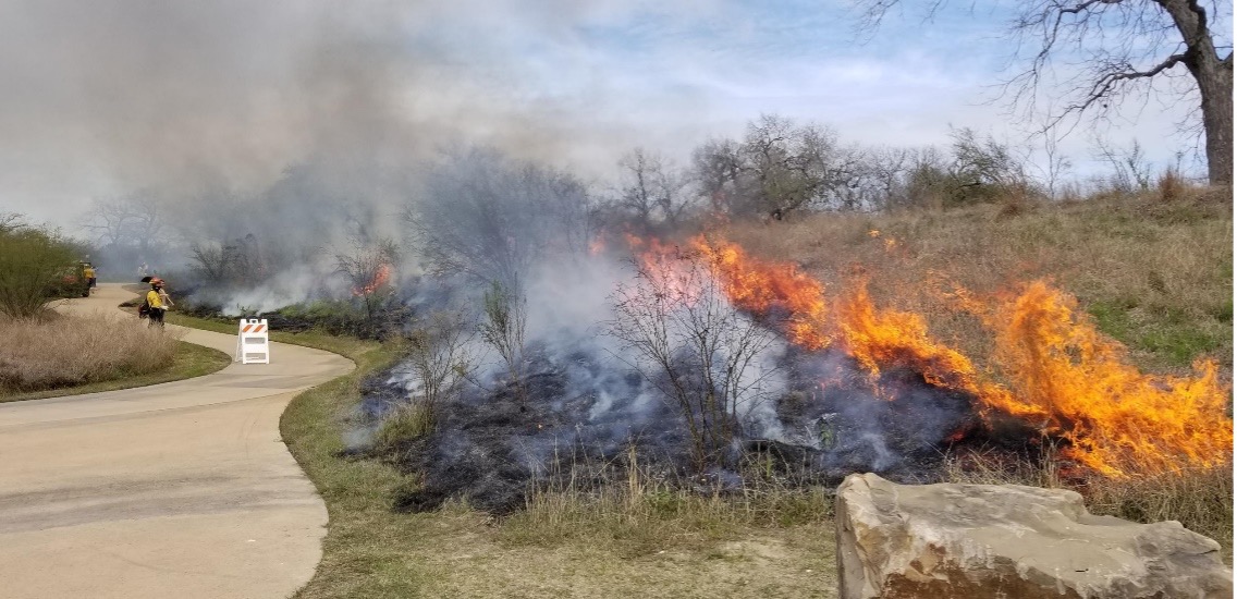 Prescribed burns along the Mission Reach Trail.