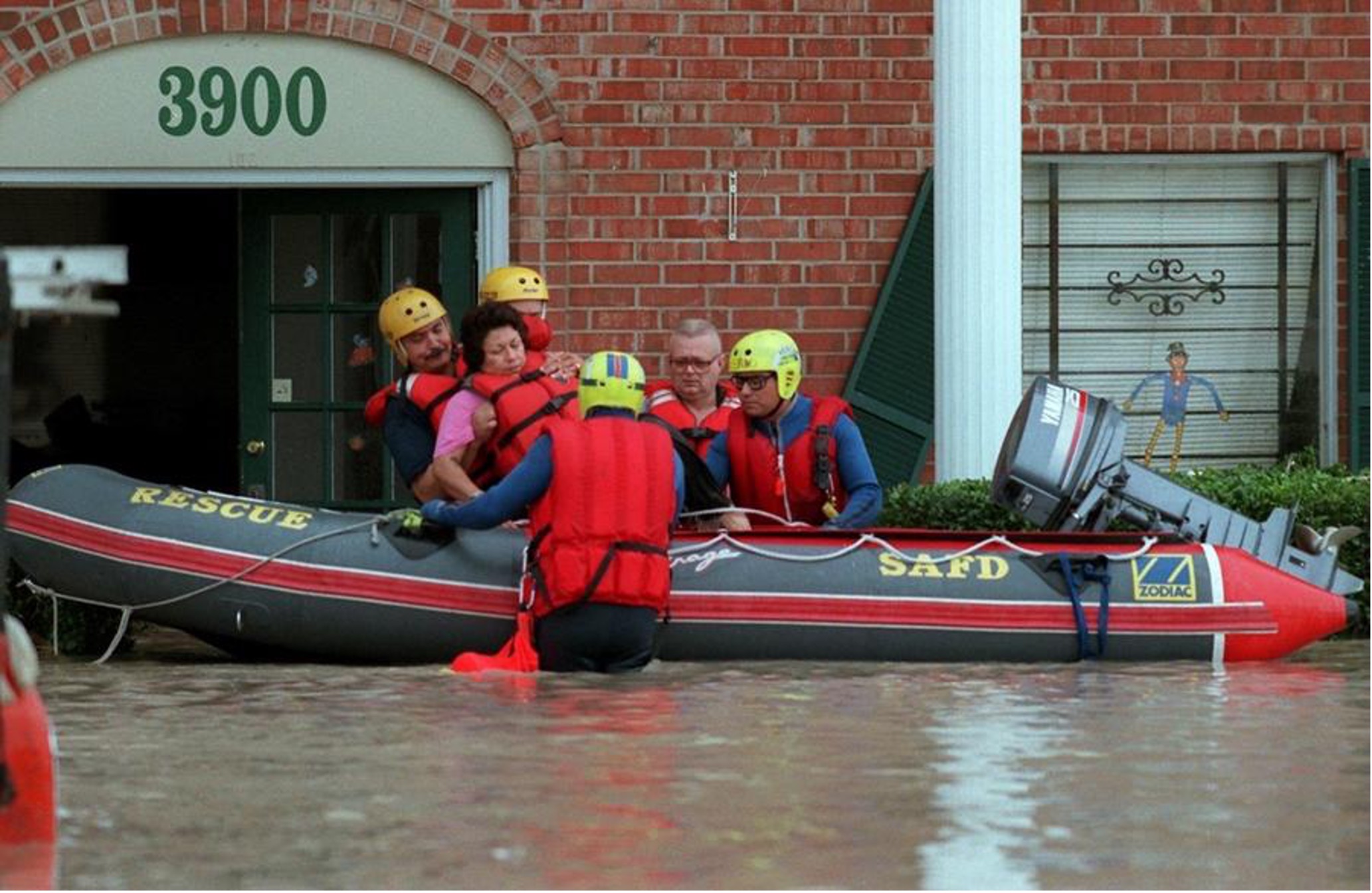 The San Antonio Fire Department conducts a rescue during major flooding in 2002. Photo credit: San Antonio Express-News