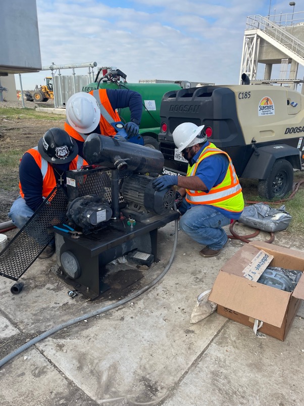 Utilities Maintenance Crew services blower used for wastewater treatment plant