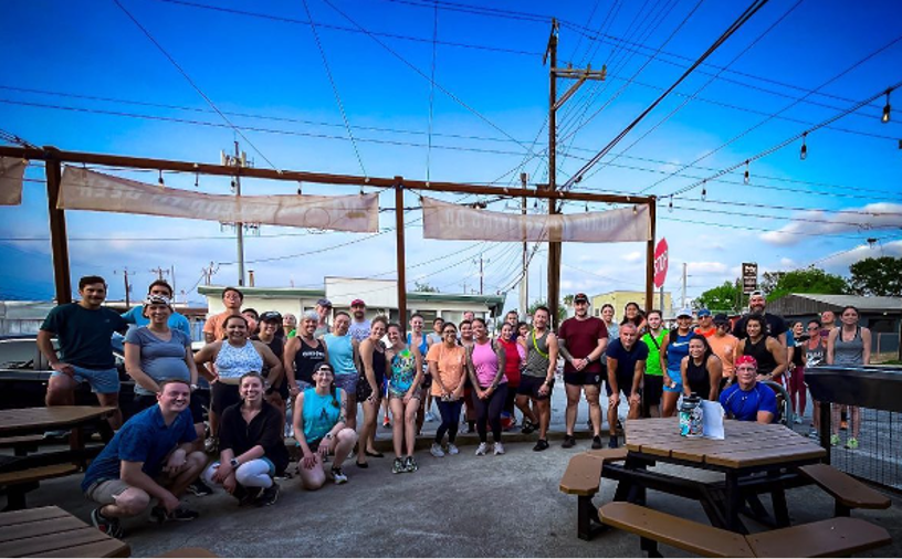 A runners group poses after a great run at the Mission Reach Trails. 