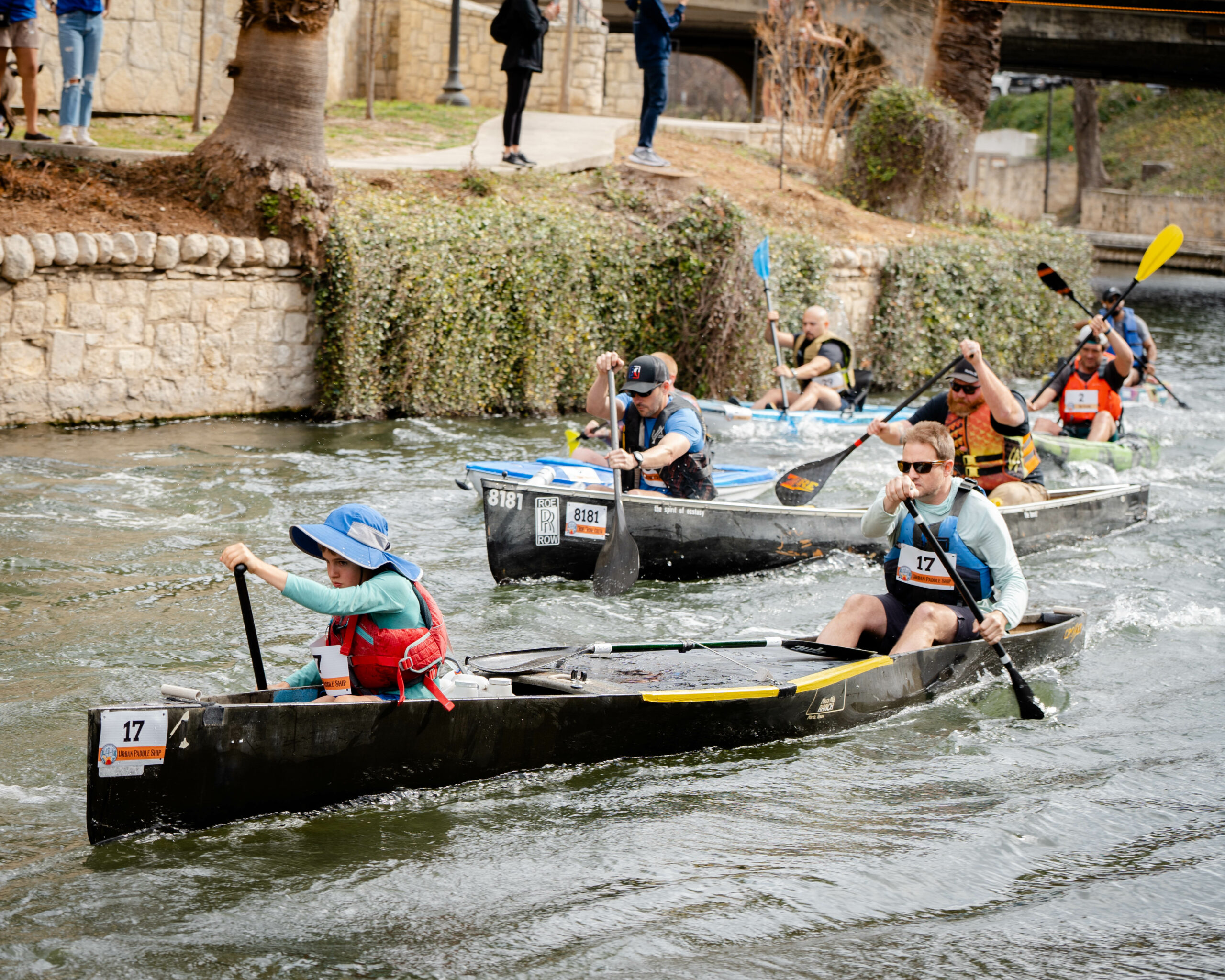 Racers begin the Battle of the Paddle Kayak Race