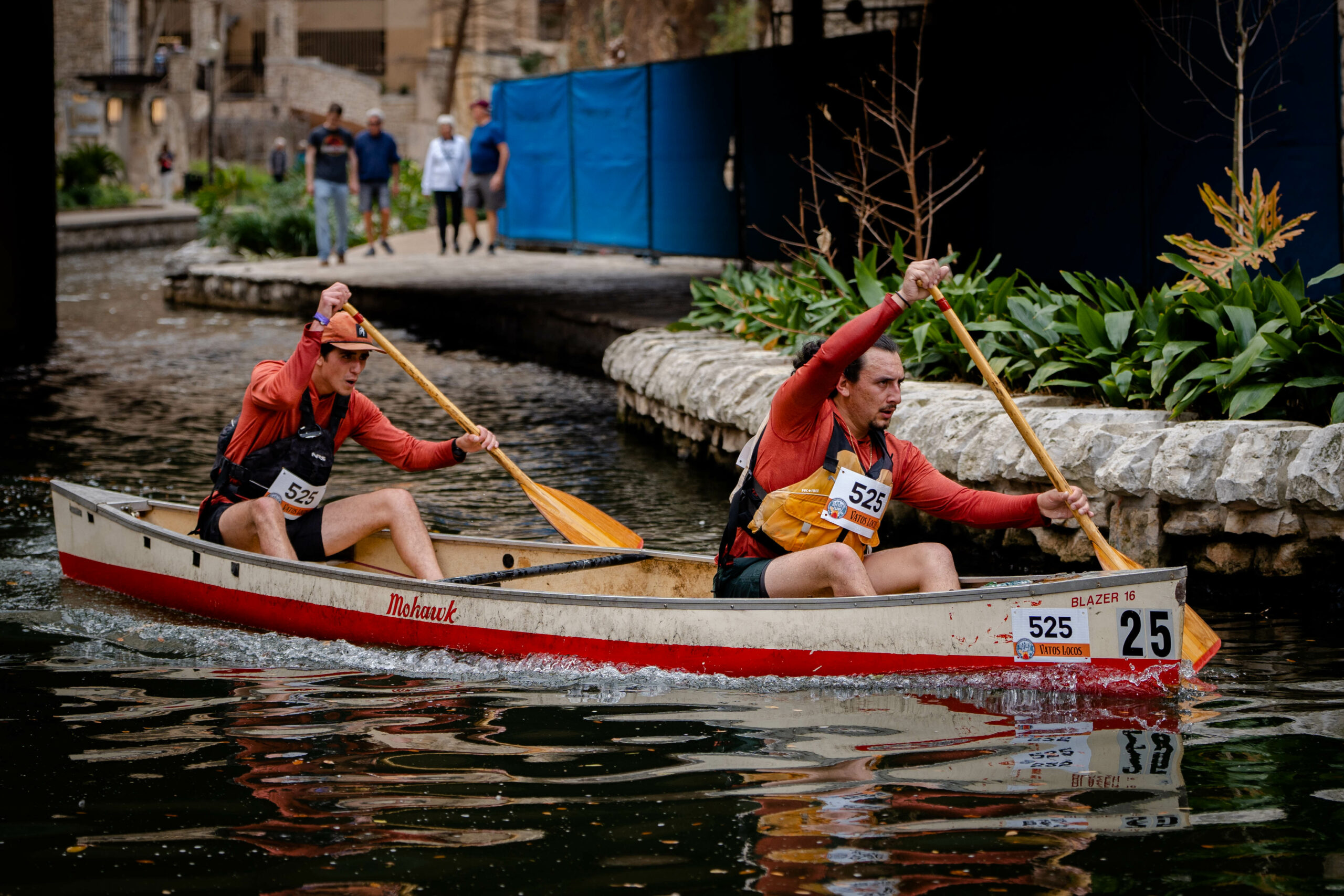 Tandem racers complete a turn down the San Antonio River 