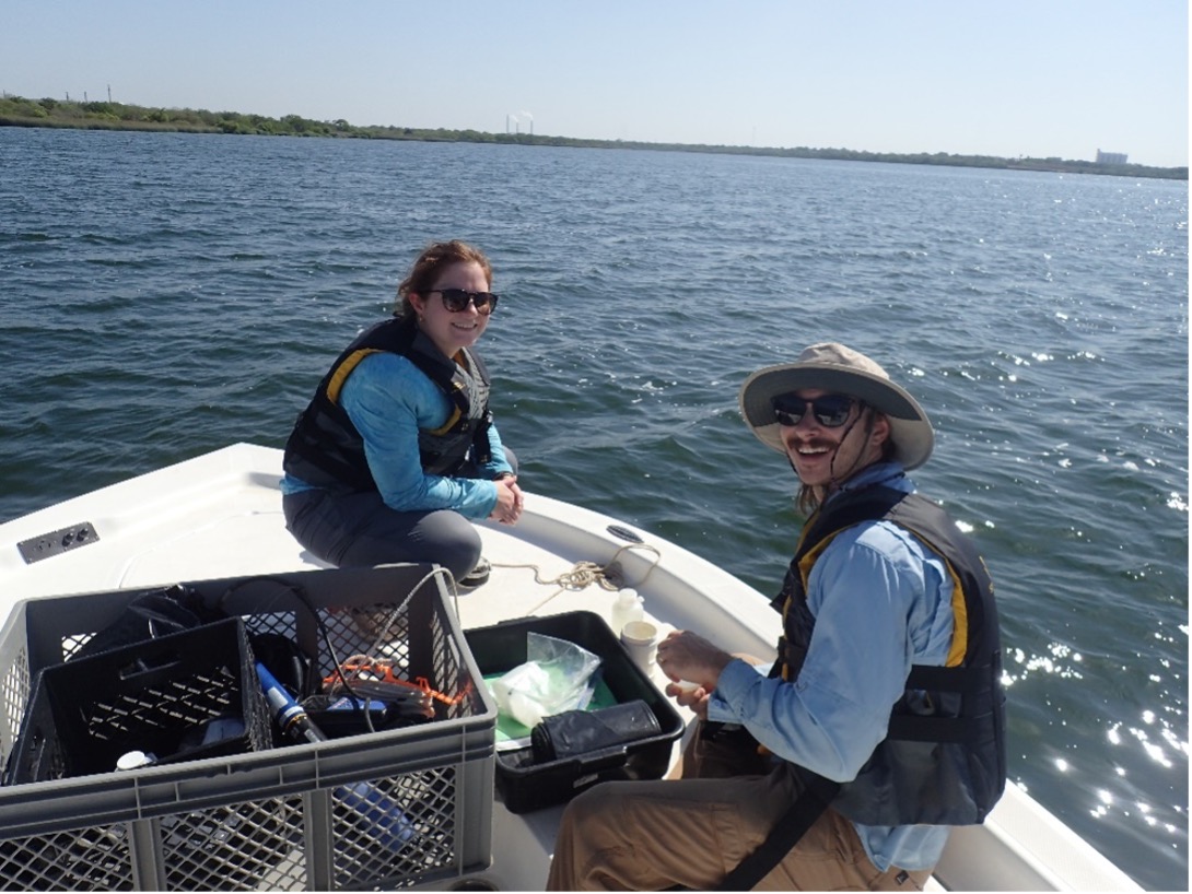 Two River Authority Biologists sail along the river collecting mussels.