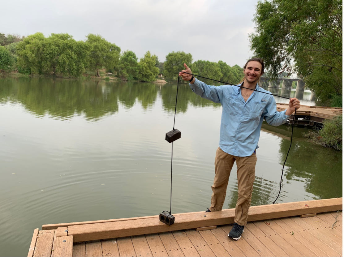 River Authority Scientist shows off equipment for mussel monitoring.