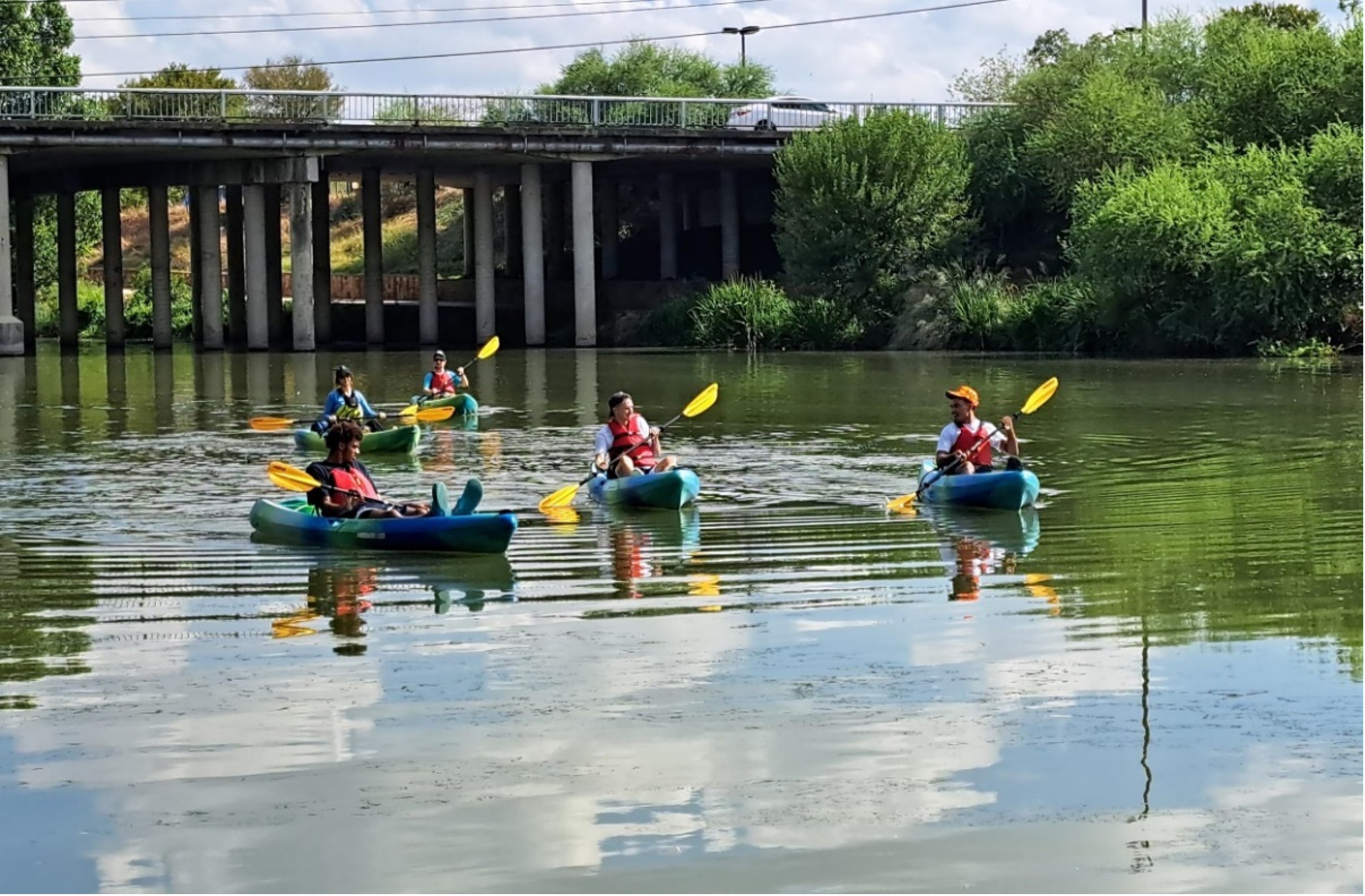 Spurs basketball players kayak down the river