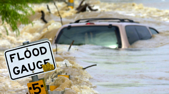 Car submerged in floodwaters 