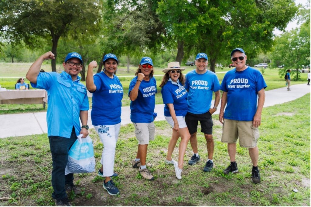 Engagement and Volunteer Coordinator Minna Paul with River Warriors after successful clean up event.