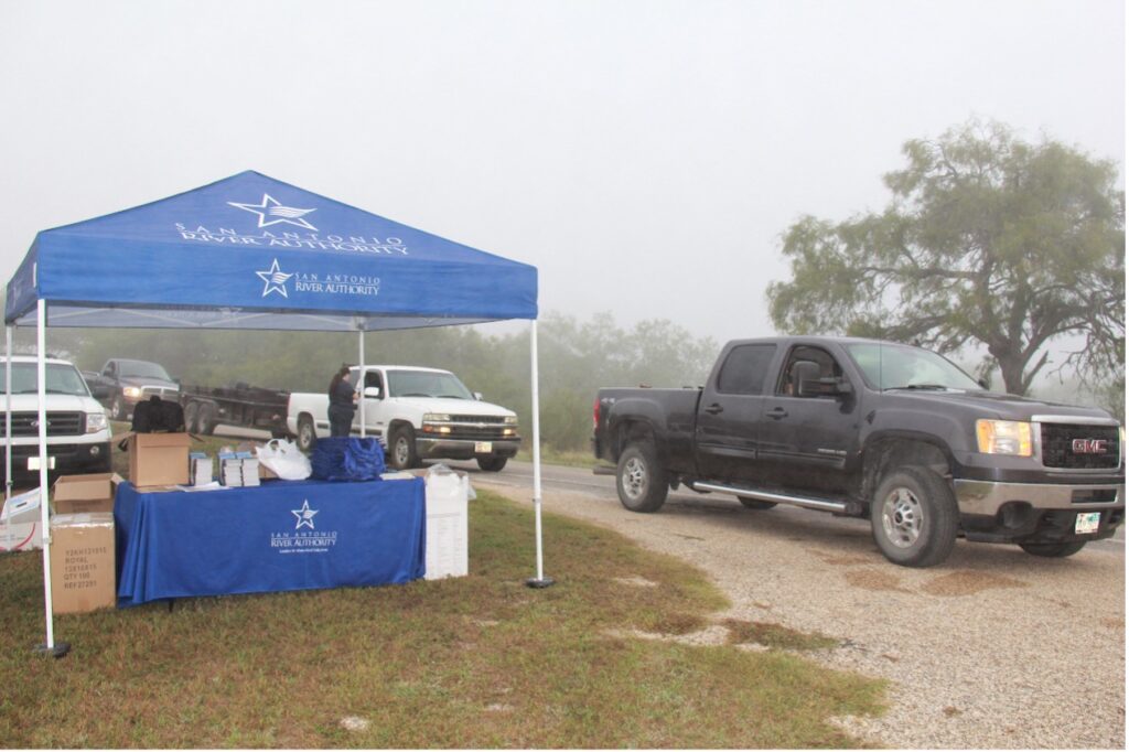 Cars line up for the bi-annual Household Hazardous Waste Collection Event