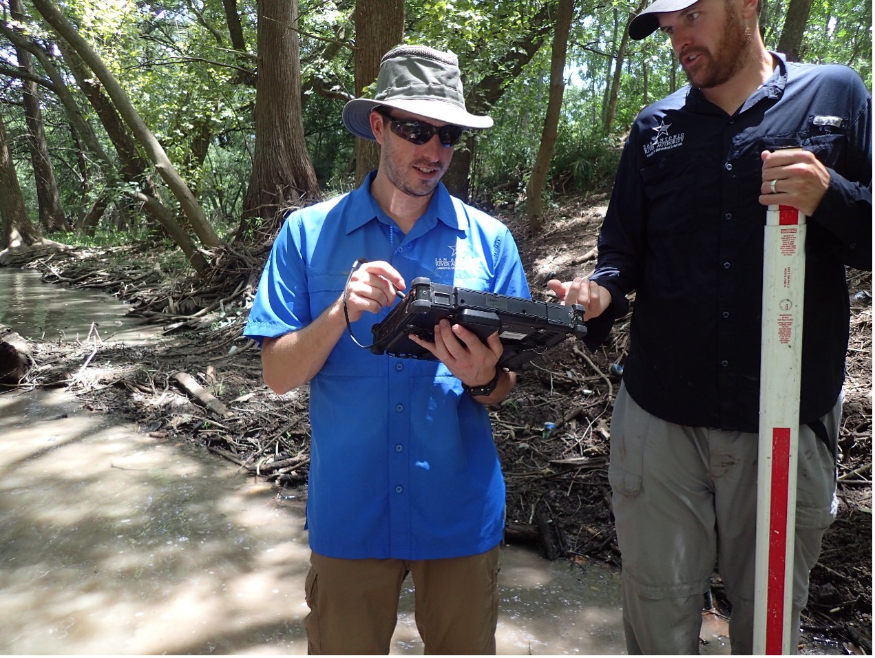 Field Scientist document water quality of the river