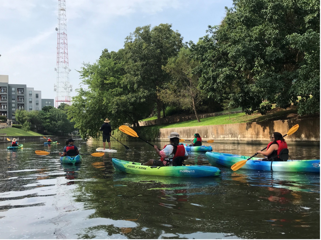 Students kayak in the San Antonio River 