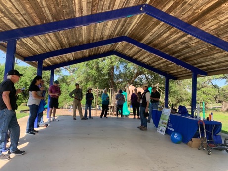 Master Naturalists gather under pavilion for observation event.