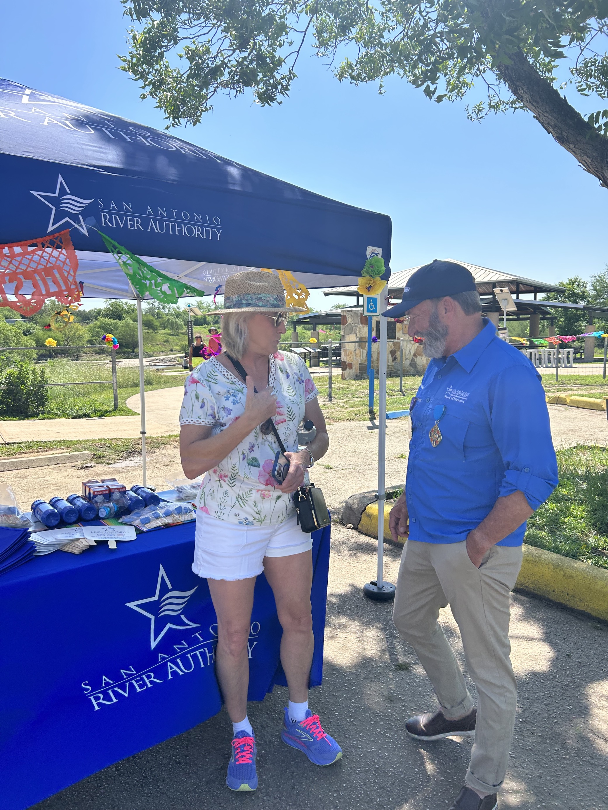 Board Members Deb Prost and Jim Campbell meet at Fiesta Floatilla event