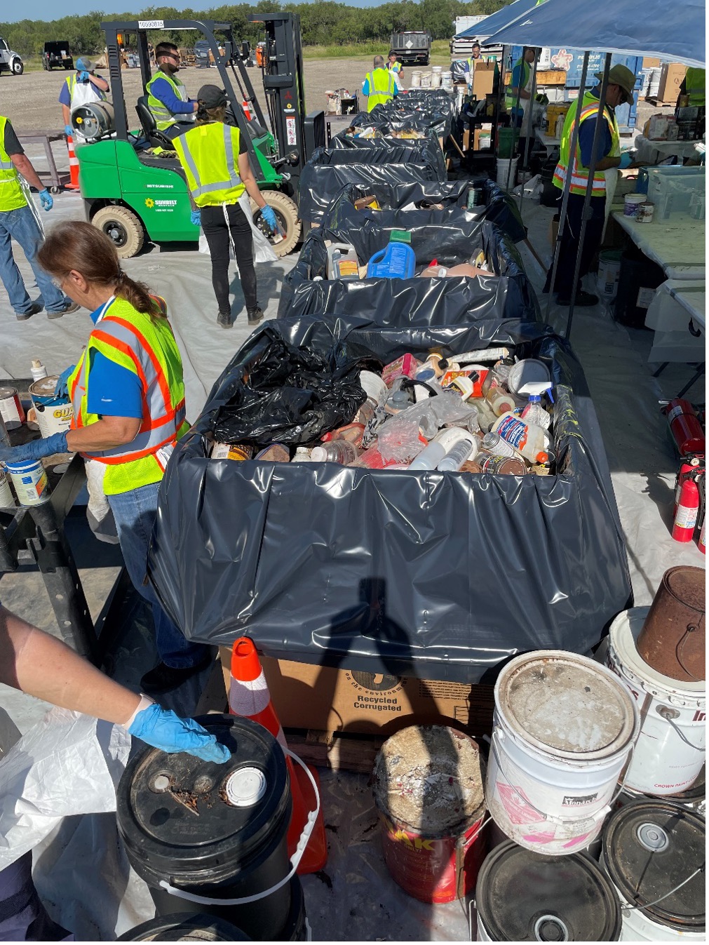 Collection bins filled with Household Hazardous Waste Materials