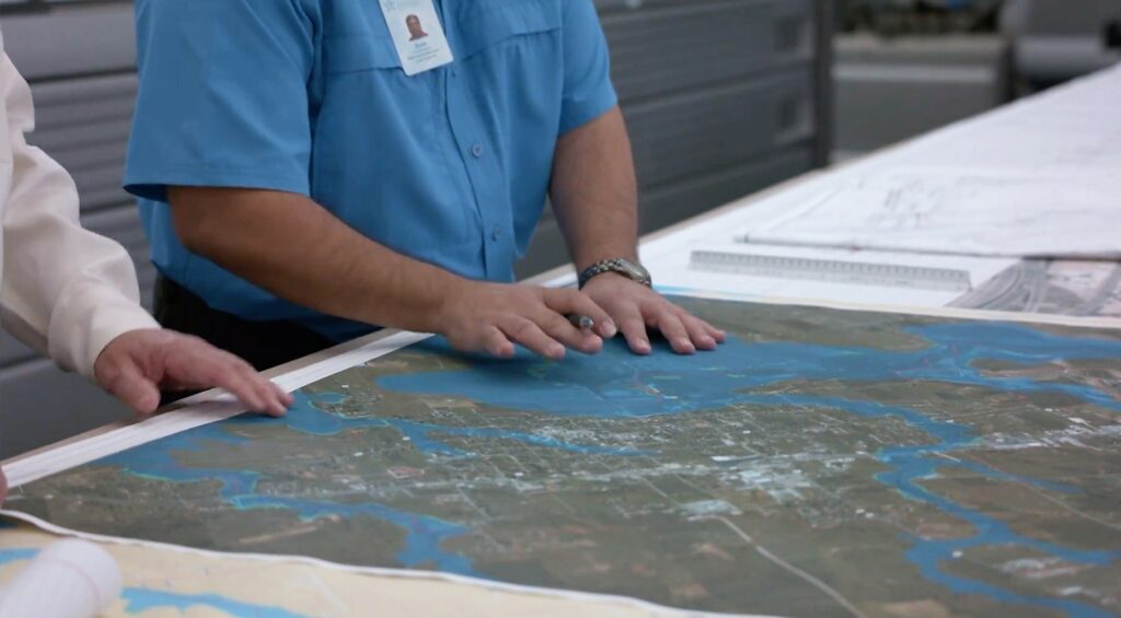 City planners working with flood map