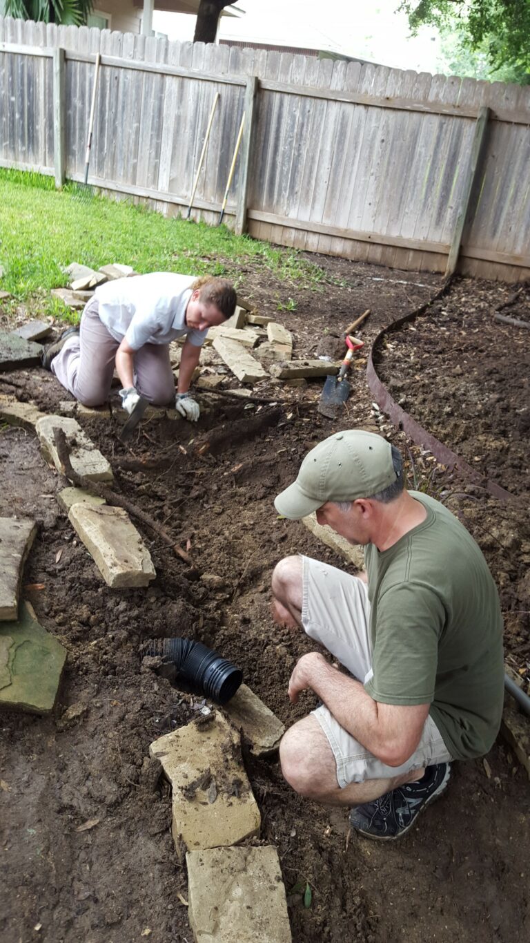 Residents installing rain garden