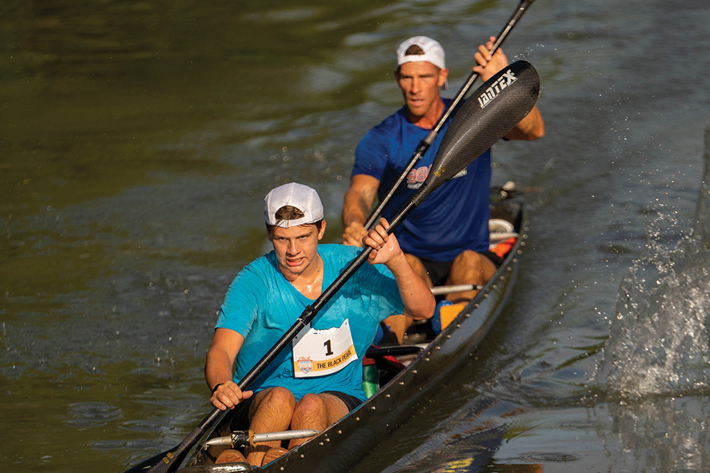 Tandem Paddlers race the river series