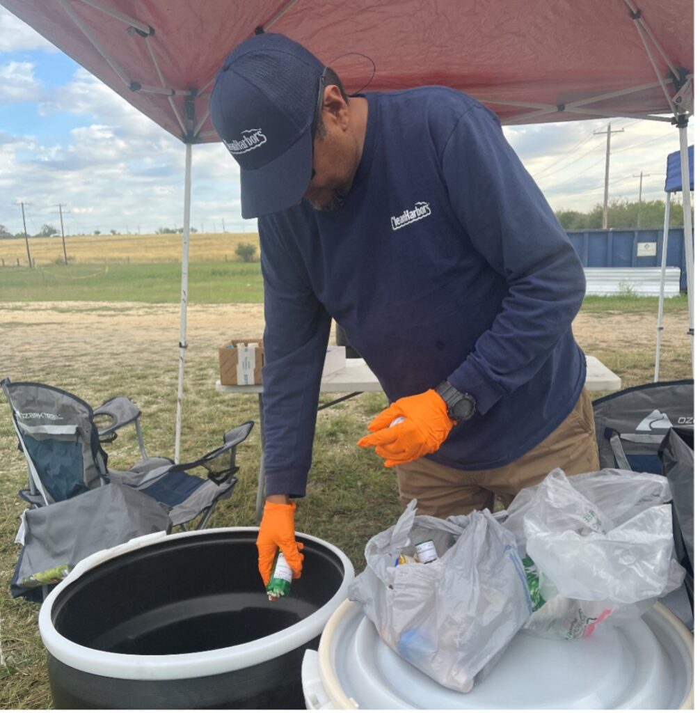 A man disposes of prescription medicine into bin.