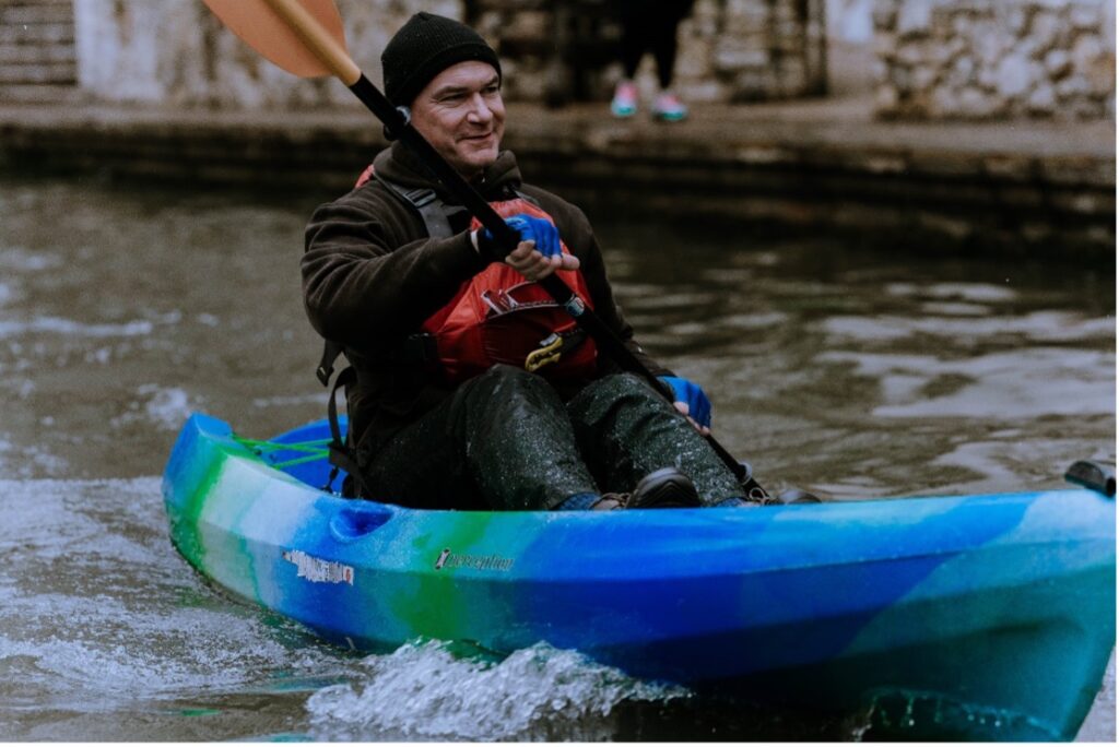 General Manager Derek Boese in a kayak