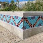 Bench with colorful tiles on it