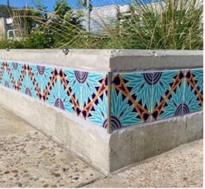 Bench with colorful tiles on it