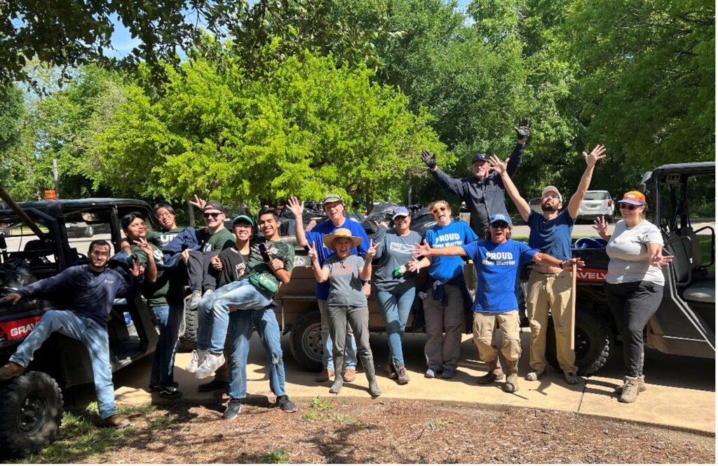 Group of River Warriors gather around after clean up