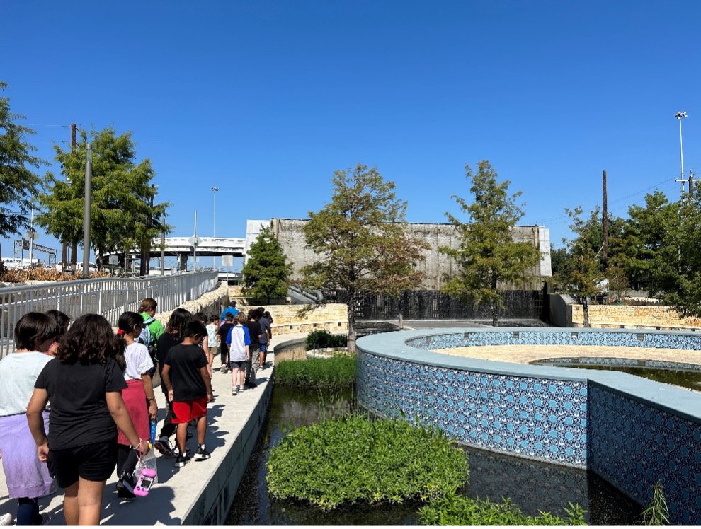 Student walk along the path towards San Pedro Creek Culture Park