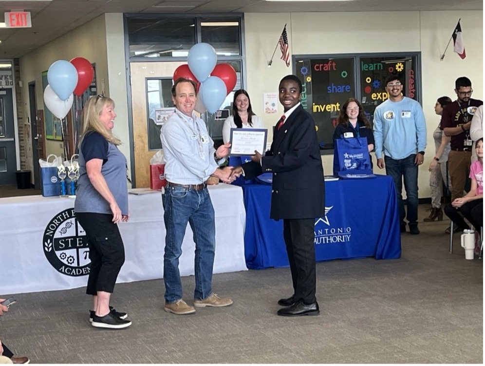 A teacher receives an achievement