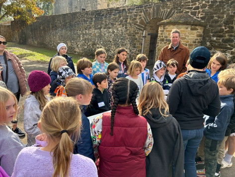 Group of students gather for presentation