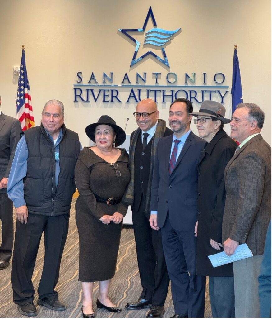 Lourdes Galvan poses with US Representative Joaquin Castro, and other community members