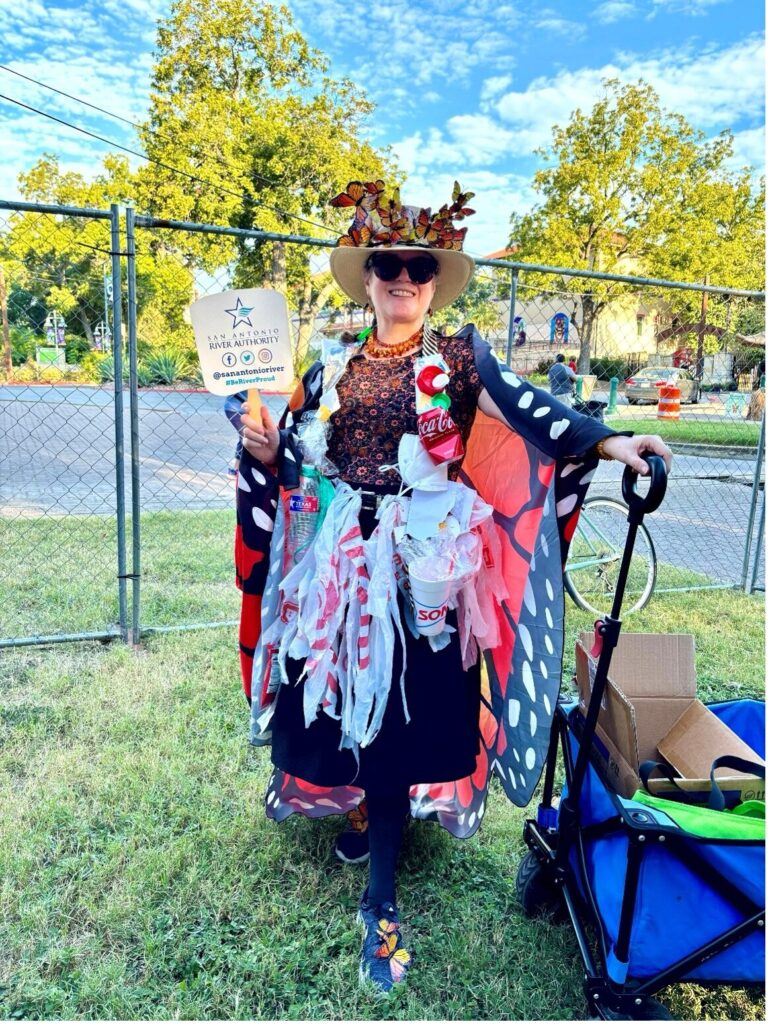 A woman dressed as a litter bug