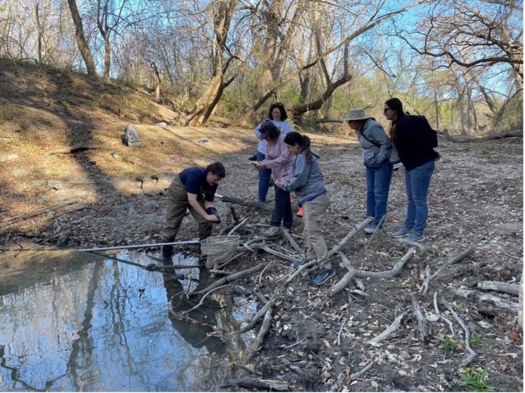 River Authority Scientists observe the effects of the drought on a riverbank