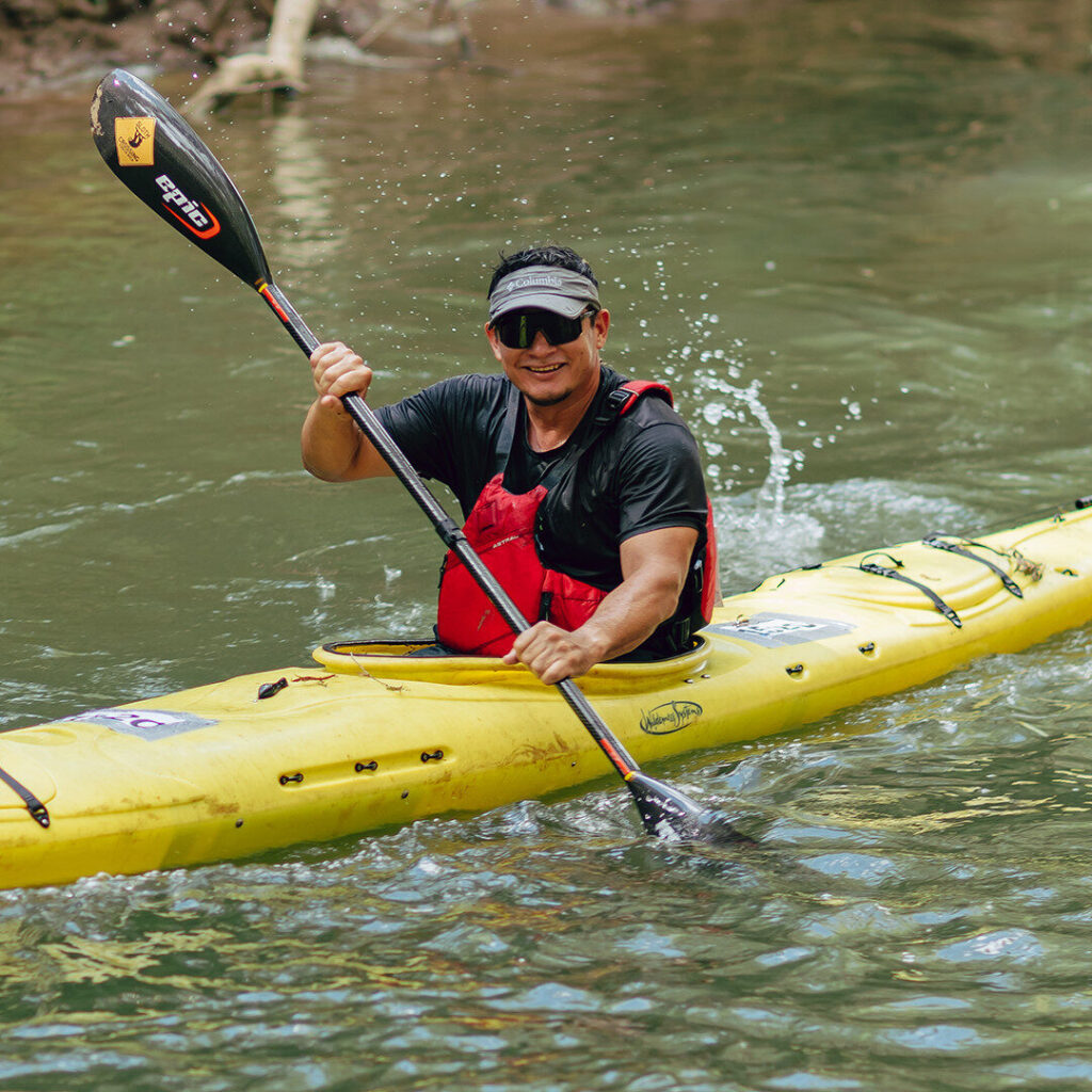 SASPAMCO Race the River paddler in a kayak