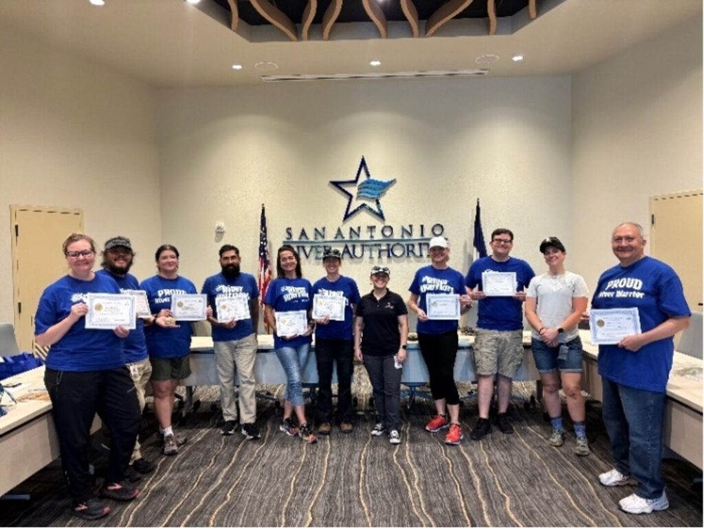 Volunteers with their certificates of completion. 