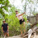 A woman throwing a disc