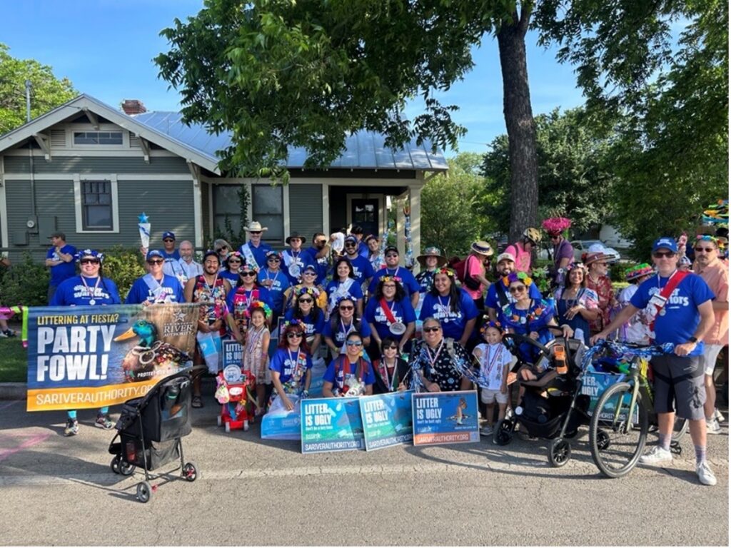 River Authority staff, volunteers, and Litter Bugs at last year’s King William Parade, celebrating Fiesta while helping keep the route clean.