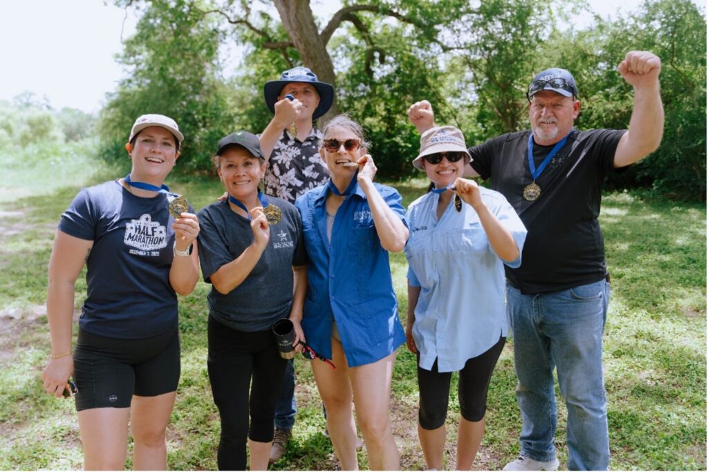 Patrice (middle) with the River Legion team at the River Odyssey competition.