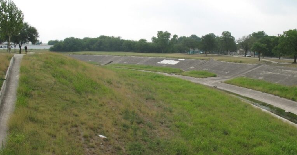 Concrete channelization from a flood control project along Apache Creek.